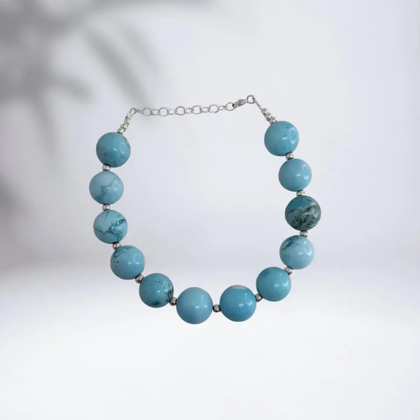 Pulseira turquesa com bolas G
