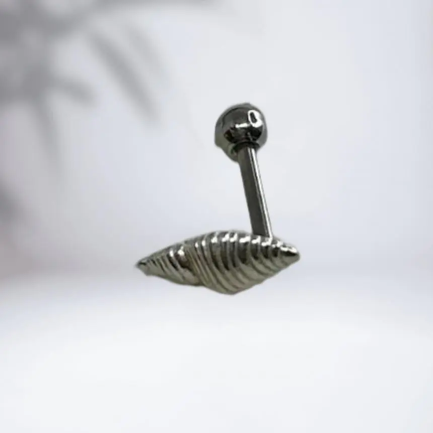 Piercing concha do mar