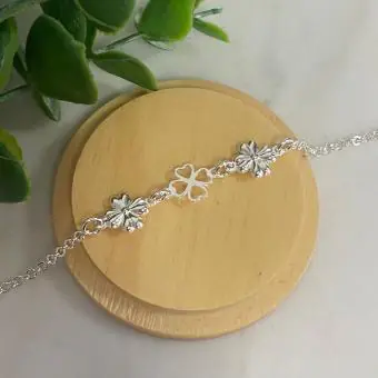 Pulseira elos duas flores e trevo central