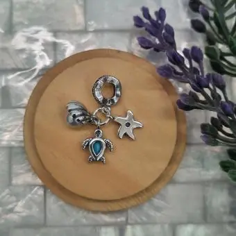 BERLOQUE TARTARUGA, CONCHA COM PEROLA E ESTRELA MAR