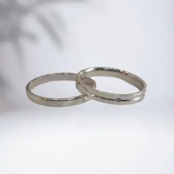 Conjunto aliança reta ponto luz zirconia e lisa - Código 1660