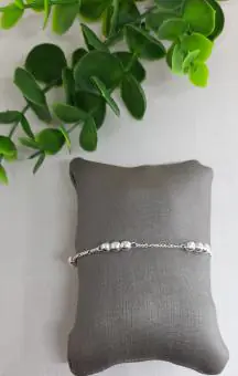 Pulseira tres bolinhas