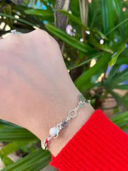 Pulseira corações e concha