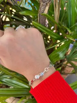 Pulseira corações e concha