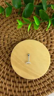Piercing simbolo Own