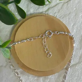 Pulseira bolinha e canutilho pingente coração